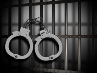 jail bars and cuffs