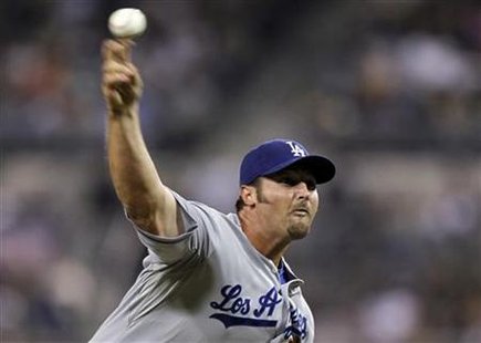 Los Angeles Dodgers relief pitcher Broxton pitches against the San Diego Padres during their National League MLB baseball game in San Diego Los Angeles Dodgers relief pitcher Broxton pitches against the San Diego Padres during their National League MLB baseball game in San Diego