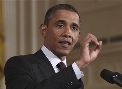 U.S. President Obama gestures as he answers a question during a news conference in Washington U.S. President Obama gestures as he answers a question during a news conference in Washington