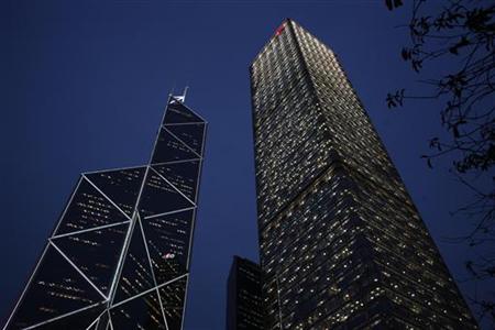 A evening view of Cheung Kong Centre and the Bank of China Tower at Hong Kong's business Central district A evening view of Cheung Kong Centre and the Bank of China Tower at Hong Kong's business Central district