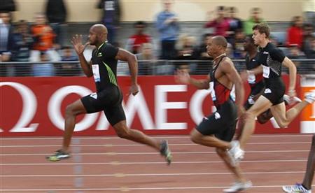Powell from Jamaica runs to win men's 100 metres during Lausanne Diamond League athletics meeting in Lausanne Powell from Jamaica runs to win men's 100 metres during Lausanne Diamond League athletics meeting in Lausanne