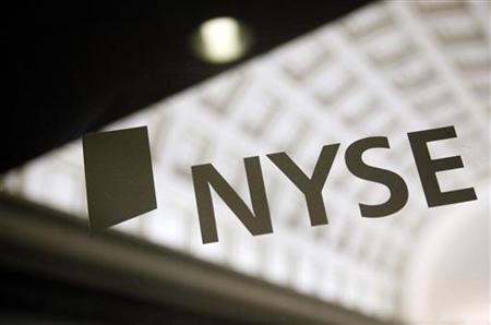 The sign of the New York Stock Exchange is seen on a door The sign of the New York Stock Exchange is seen on a door