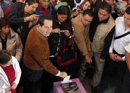 Eruviel Avila, candidate for governor of the state of Mexico for the PRI, casts his vote in Ecatepec Eruviel Avila, candidate for governor of the state of Mexico for the PRI, casts his vote in Ecatepec