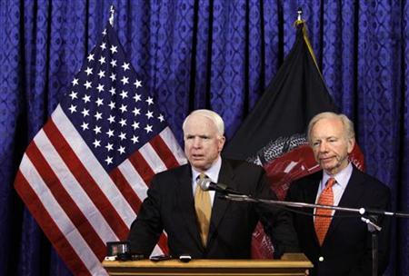 John McCain speaks as Joe Lieberman looks on during a news conference at the International Security Assistance Force headquarters in Kabul John McCain speaks as Joe Lieberman looks on during a news conference at the International Security Assistance Force headquarters in Kabul