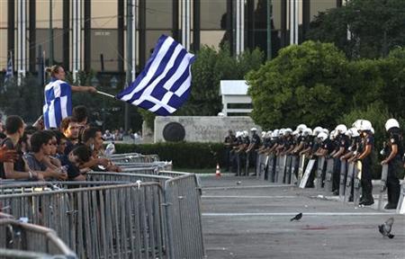 Protesters take part in a rally against austerity in front of the parliament at Constitution square in Athens