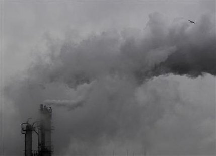 Smoke billows from chimneys at an industrial district near Tokyo Smoke billows from chimneys at an industrial district near Tokyo