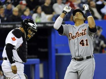 Detroit Tigers designated hitter Victor Martinez celebrates a run earlier in the 2011 season. Photo courtesy of Reuters Mike Cassese (CANADA - Tags: SPORT BASEBALL IMAGES OF THE DAY) Detroit Tigers designated hitter Victor Martinez celebrates a run earlier in the 2011 season. Photo courtesy of Reuters Mike Cassese (CANADA - Tags: SPORT BASEBALL IMAGES OF THE DAY)