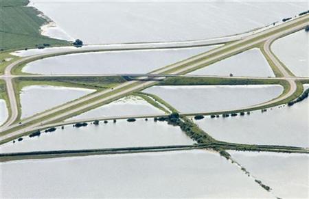 An aerial view of Missouri River flood waters moving up to an I-29 on ramp in northwest Missouri An aerial view of Missouri River flood waters moving up to an I-29 on ramp in northwest Missouri