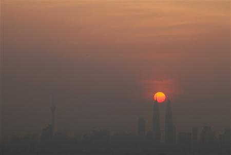 Skyline of Malaysia's capital of Kuala Lumpur is seen covered with smog Skyline of Malaysia's capital of Kuala Lumpur is seen covered with smog