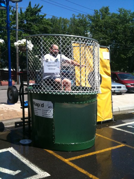 Justin in the dunk tank raising money for the Hibbing Food Shelf
