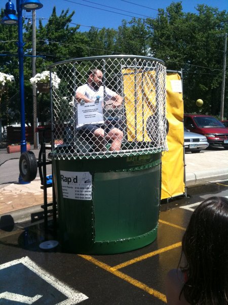 Justin in the dunk tank raising money for the Hibbing Food Shelf