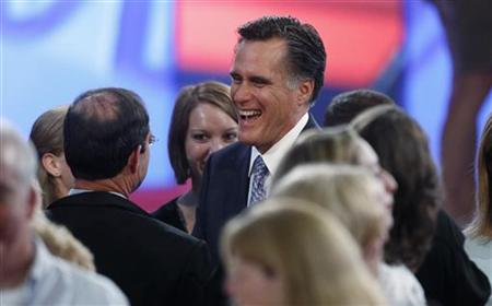 Former Massachusetts Governor Romney talks with the audience after the first New Hampshire debate of the 2012 campaign at St. Anselms Colleg Former Massachusetts Governor Romney talks with the audience after the first New Hampshire debate of the 2012 campaign at St. Anselms Colleg