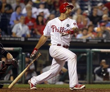 Phillies Ibanez watches his solo game winning walk off home run against the Braves in Philadelphia Phillies Ibanez watches his solo game winning walk off home run against the Braves in Philadelphia