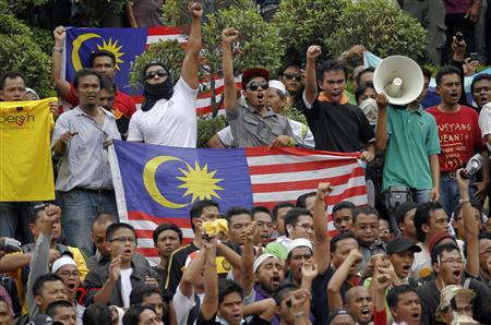 Over 1400 arrested, tear gas fired in Malaysia protest - 1450 WHTC ...