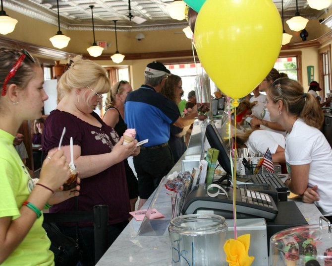Ice Cream, Fudge, Freebies, Face Panting, Balloons, Bands, and Bright Colors! We Had A Great Time!