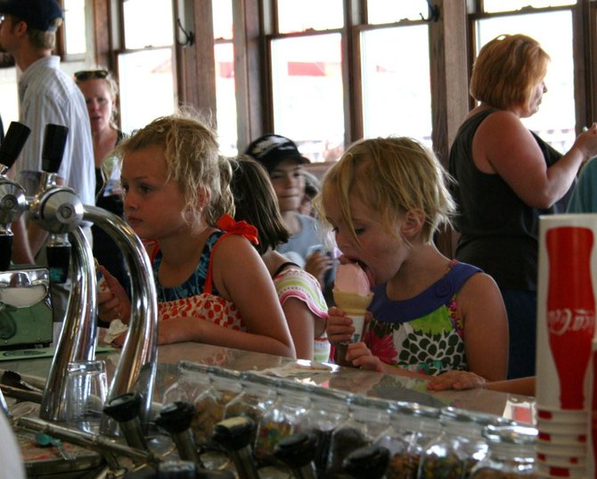 Ice Cream, Fudge, Freebies, Face Panting, Balloons, Bands, and Bright Colors! We Had A Great Time!