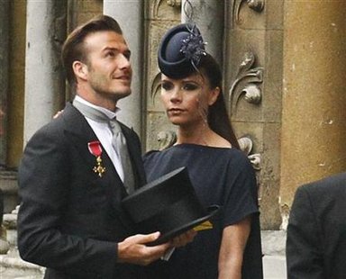 Soccer star David Beckham and his wife Victoria arrive at Westminster Abbey before the wedding of Britain's Prince William and Kate Middleto Soccer star David Beckham and his wife Victoria arrive at Westminster Abbey before the wedding of Britain's Prince William and Kate Middleto