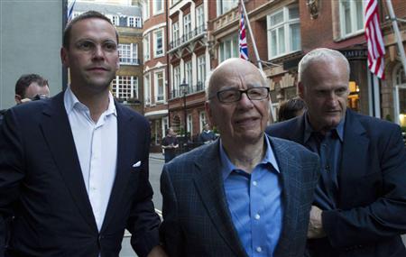 James and Rupert Murdoch and a minder leave the Stafford Hotel in St James's Place, central London James and Rupert Murdoch and a minder leave the Stafford Hotel in St James's Place, central London
