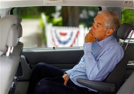 Republican presidential candidate and U.S. Congressman Ron Paul waits in his vehicle after a campaign stop at the Freedom Village Store in F