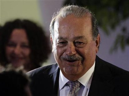 Mexican tycoon Carlos Slim arrives to attend the opening of the Soumaya museum in Mexico City Mexican tycoon Carlos Slim arrives to attend the opening of the Soumaya museum in Mexico City