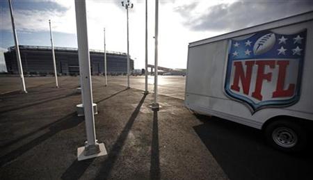 The NFL logo is seen on a trailer parked near the New Meadowlands Stadium where the Jets and Giants NFL football teams play home games in Ea The NFL logo is seen on a trailer parked near the New Meadowlands Stadium where the Jets and Giants NFL football teams play home games in Ea