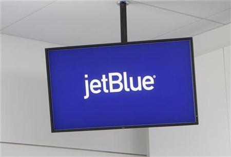 JetBlue Airways logo is displayed on a monitor in Terminal 5 at JFK International Airport in New York JetBlue Airways logo is displayed on a monitor in Terminal 5 at JFK International Airport in New York
