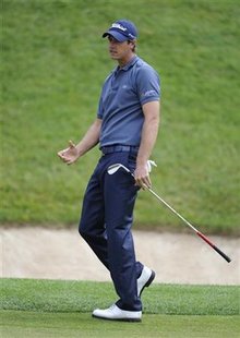 Belgium's Colsaerts reacts after his chip to the second green at the 2011 U.S. Open in Maryland Belgium's Colsaerts reacts after his chip to the second green at the 2011 U.S. Open in Maryland