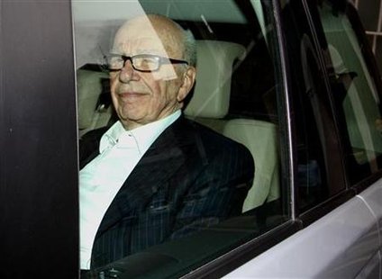 News Corporation CEO Rupert Murdoch arrives back at his flat in central London News Corporation CEO Rupert Murdoch arrives back at his flat in central London