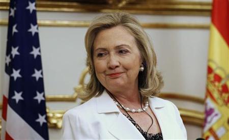 U.S. Secretary of State Clinton smiles during a joint news conference with Spanish Foreign Minister Jimenez in Madrid U.S. Secretary of State Clinton smiles during a joint news conference with Spanish Foreign Minister Jimenez in Madrid