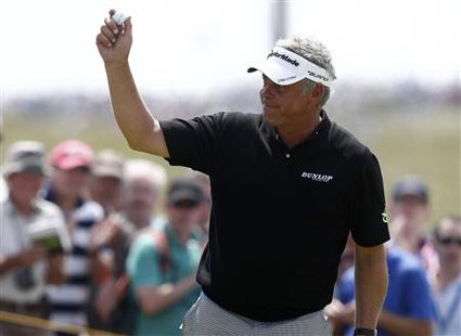Darren Clarke of Northern Ireland celebrates during the second round of the British Open golf championship at Royal St George's in Sandwich Darren Clarke of Northern Ireland celebrates during the second round of the British Open golf championship at Royal St George's in Sandwich