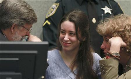 Anthony smiles at her attorney Mason before sentencing at the Orange County Courthouse in Orlando Anthony smiles at her attorney Mason before sentencing at the Orange County Courthouse in Orlando