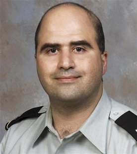 File handout showing Hasan, U.S. Army psychiatrist identified by authorities as suspect in shooting at U.S. Army post in Fort Hood, Texas File handout showing Hasan, U.S. Army psychiatrist identified by authorities as suspect in shooting at U.S. Army post in Fort Hood, Texas