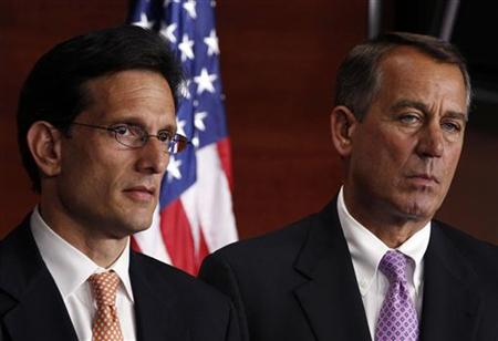 John Boehner and Eric Cantor listen to Republican House leaders discuss the Balanced Budget Amendment at a news conference in Washington