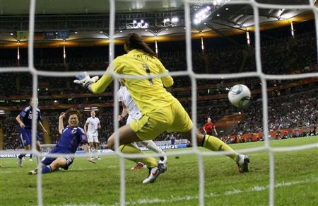 Miyama of Japan scores against U.S. goalkeeper Solo during their Women's World Cup final soccer match in Frankfurt Miyama of Japan scores against U.S. goalkeeper Solo during their Women's World Cup final soccer match in Frankfurt