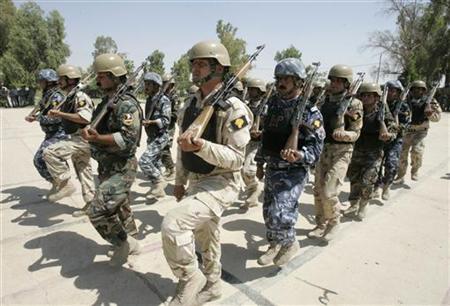 Iraqi soldiers, policemen and Kurdish Peshmerga troops of the Golden Lion forces, a mixed squad put together to secure disputed areas where Iraqi soldiers, policemen and Kurdish Peshmerga troops of the Golden Lion forces, a mixed squad put together to secure disputed areas where