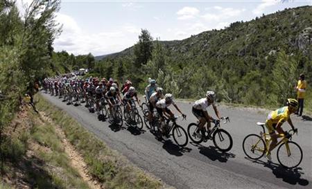 Voeckler of France rides ahead of the pack during the 15th stage of the Tour de France 2011 cycling race from Limoux to Montpellier Voeckler of France rides ahead of the pack during the 15th stage of the Tour de France 2011 cycling race from Limoux to Montpellier