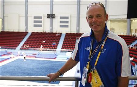British team director of elite performance Woodward poses for photographers during a visit to training venues in Macau British team director of elite performance Woodward poses for photographers during a visit to training venues in Macau