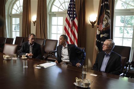 President Barack Obama sits with House Speaker John Boehner and Senate Majority Leader Harry Reid during a meeting in Washington President Barack Obama sits with House Speaker John Boehner and Senate Majority Leader Harry Reid during a meeting in Washington
