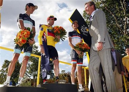 BMC Racing Team's Cadel Evans of Australia is congratulated by Grand Duke Henri of Luxembourg after winning the 98th Tour de France cycling BMC Racing Team's Cadel Evans of Australia is congratulated by Grand Duke Henri of Luxembourg after winning the 98th Tour de France cycling