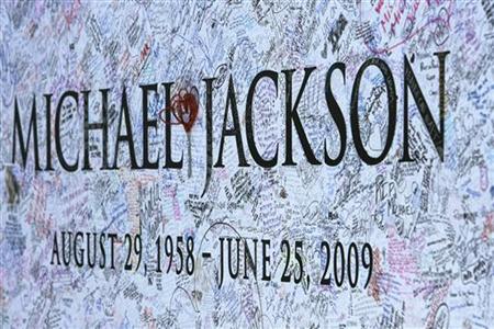 A section of a large Michael Jackson poster is pictured outside Staples Center in Los Angeles A section of a large Michael Jackson poster is pictured outside Staples Center in Los Angeles