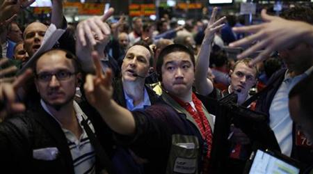 Traders work in the 10 Year Treasury Bill Options Pit at the Chicago Mercantile Exchange Traders work in the 10 Year Treasury Bill Options Pit at the Chicago Mercantile Exchange