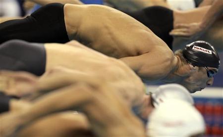 Phelps of the U.S. gets ready for the men's 200m freestyle semi-final at the 14th FINA World Championships in Shanghai Phelps of the U.S. gets ready for the men's 200m freestyle semi-final at the 14th FINA World Championships in Shanghai