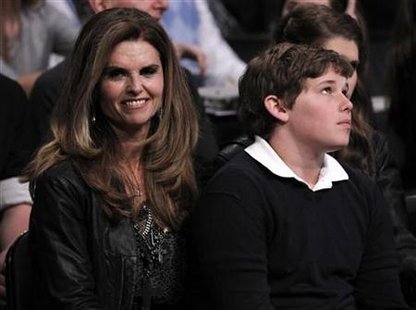 Maria Shriver (L) and son Christopher Schwarzenegger attend the NBA basketball All-Star weekend in Los Angeles Maria Shriver (L) and son Christopher Schwarzenegger attend the NBA basketball All-Star weekend in Los Angeles