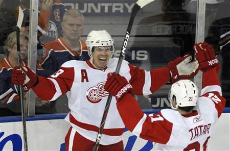 Red Wings' Draper and Tatar celebrate goal against Oilers during their NHL hockey game in Edmonton Red Wings' Draper and Tatar celebrate goal against Oilers during their NHL hockey game in Edmonton