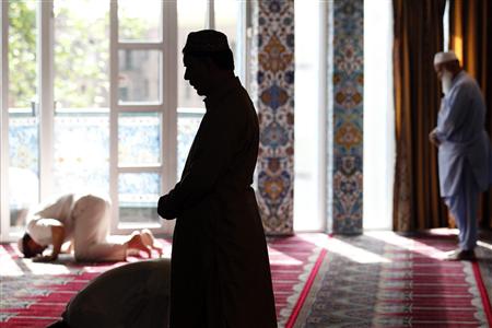 Muslim men pray at the World Islamic Mission Mosque in Oslo Muslim men pray at the World Islamic Mission Mosque in Oslo