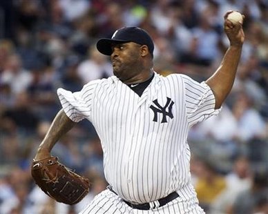 New York Yankees' Sabathia pitches to the Seattle Mariners in New York New York Yankees' Sabathia pitches to the Seattle Mariners in New York