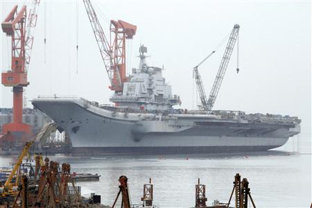 File picture of a vessel at a port in Dalian, reported to be the Ukrainian-made aircraft carrier "Varyag" bought by China File picture of a vessel at a port in Dalian, reported to be the Ukrainian-made aircraft carrier "Varyag" bought by China