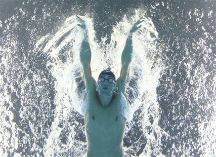 Phelps of the U.S. competes in the men's 200m butterfly final at the 14th FINA World Championships in Shanghai Phelps of the U.S. competes in the men's 200m butterfly final at the 14th FINA World Championships in Shanghai