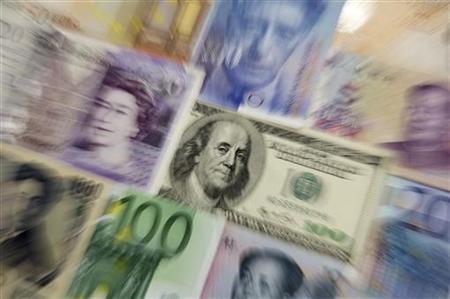 Arrangement of various world currencies including Chinese Yuan, Japanese Yen, US Dollar, Euro, British Pound, Swiss Franc pictured in Warsaw Arrangement of various world currencies including Chinese Yuan, Japanese Yen, US Dollar, Euro, British Pound, Swiss Franc pictured in Warsaw