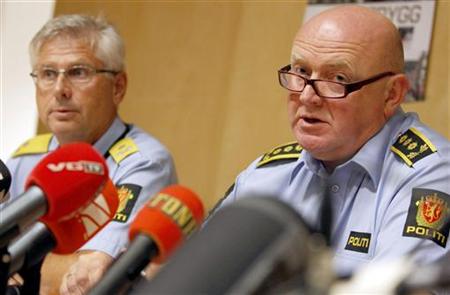 Acting Police Chief Sveinung Sponheim and Police Chief of Staff Johan Fredriksen address a news conference in Oslo